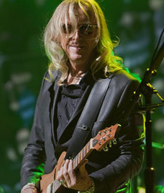 Davey Johnstone onstage with the Elton John Band